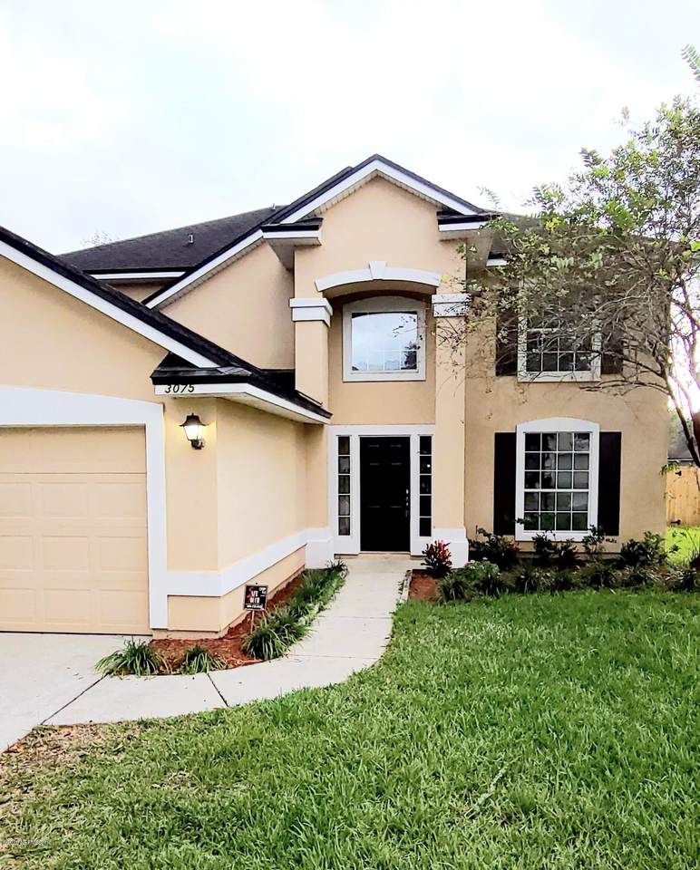 3075 Wandering Oaks Dr - Photo 1