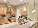 8699 Canopy Oaks Drive - Photo 7