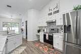 8901 Canopy Oaks Drive - Photo 15