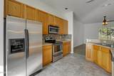 12017 Coachman Lakes Way - Photo 16