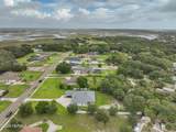 9117 Woodsman Cove Lane - Photo 44