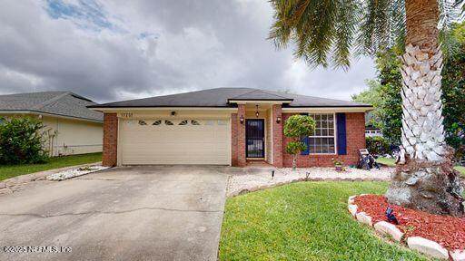 11201 Wandering Oaks Drive - Photo 1