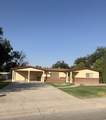 1303 Country Club Cir - Photo 1