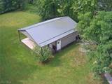12230 Painesville Warren Road - Photo 5