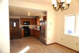 1107 3RD ST E - Photo 6