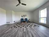 6957 Fm 100 - Photo 12