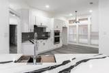 5709 Hidden Oaks Drive - Photo 11