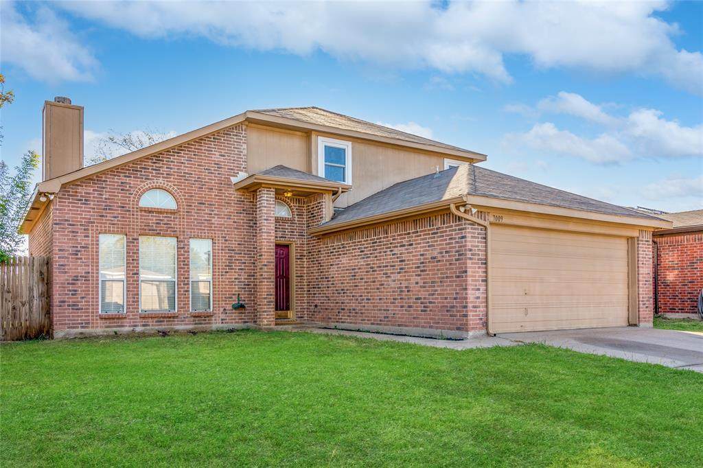 7009 Wagonwheel Road - Photo 1