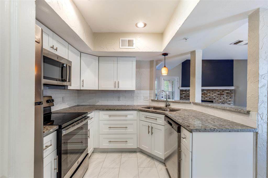 5565 Preston Oaks Road - Photo 1