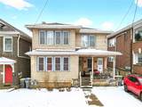 2719-2717 Broadway Ave - Photo 1