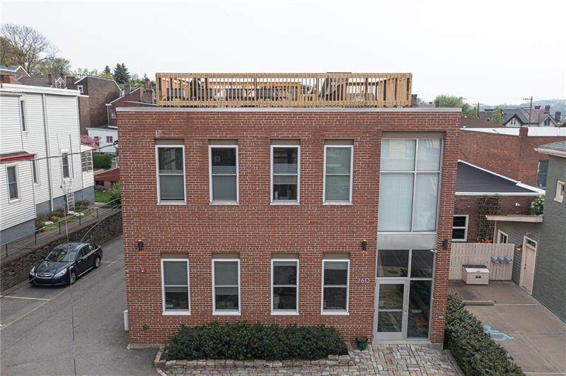 260 42nd St - Photo 1
