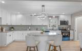 1207 73rd St - Photo 4