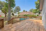 2101 Piney Woods Ct - Photo 32