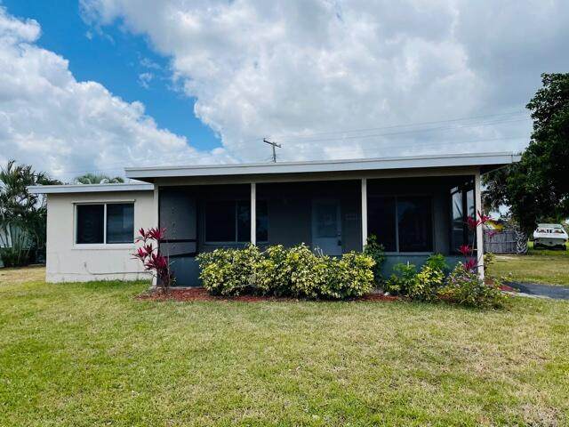 5566 Honeysuckle Drive - Photo 1