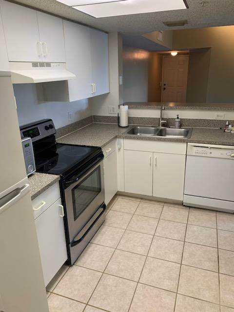 5011 Wiles Road - Photo 1