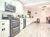 9735 El Paseo - Photo 8