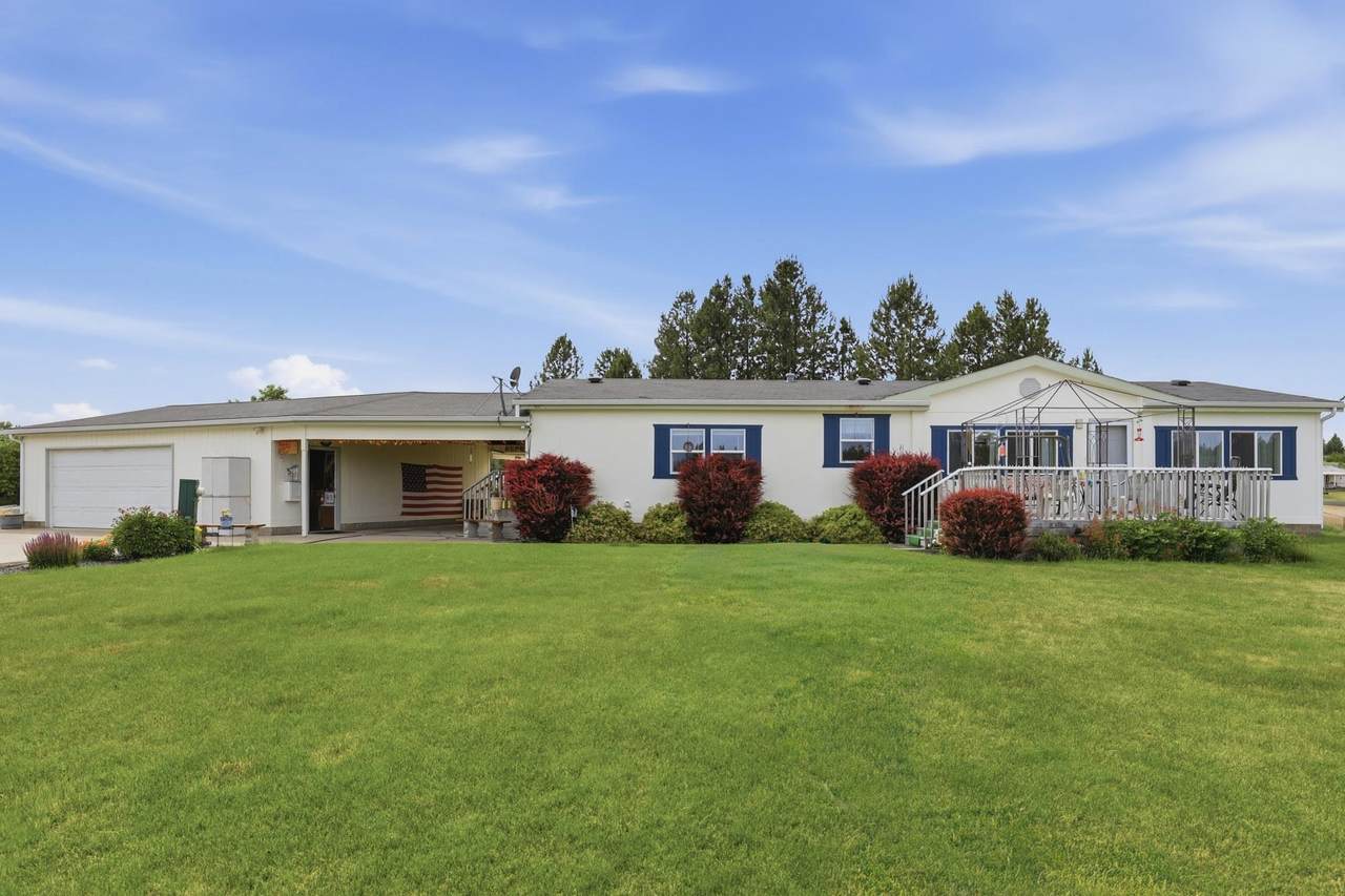 1702 Denison-Chattaroy Rd - Photo 1