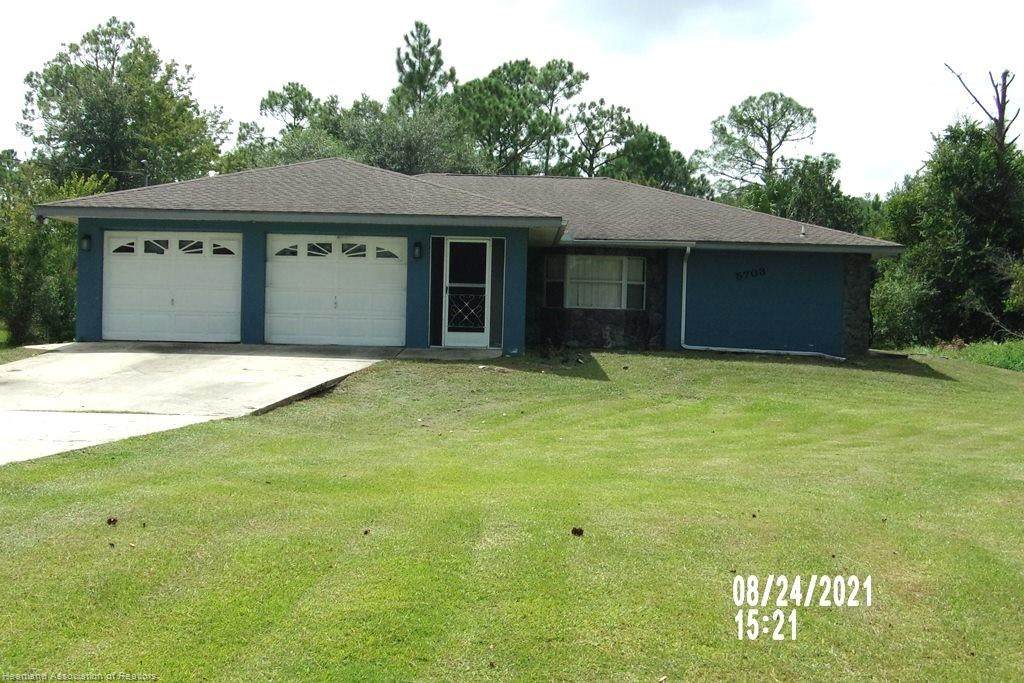 5703 Wolf Lake Road - Photo 1