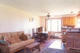 210 Cr. 365 - Photo 8