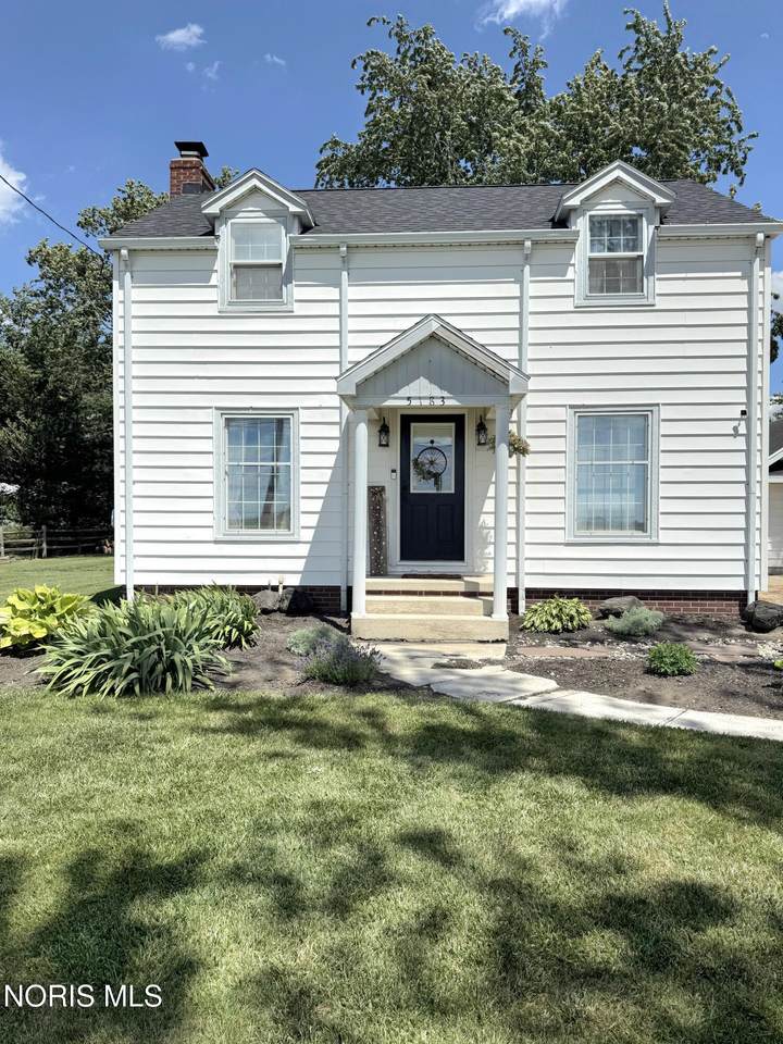 5183 Genoa Clay Center Road - Photo 1