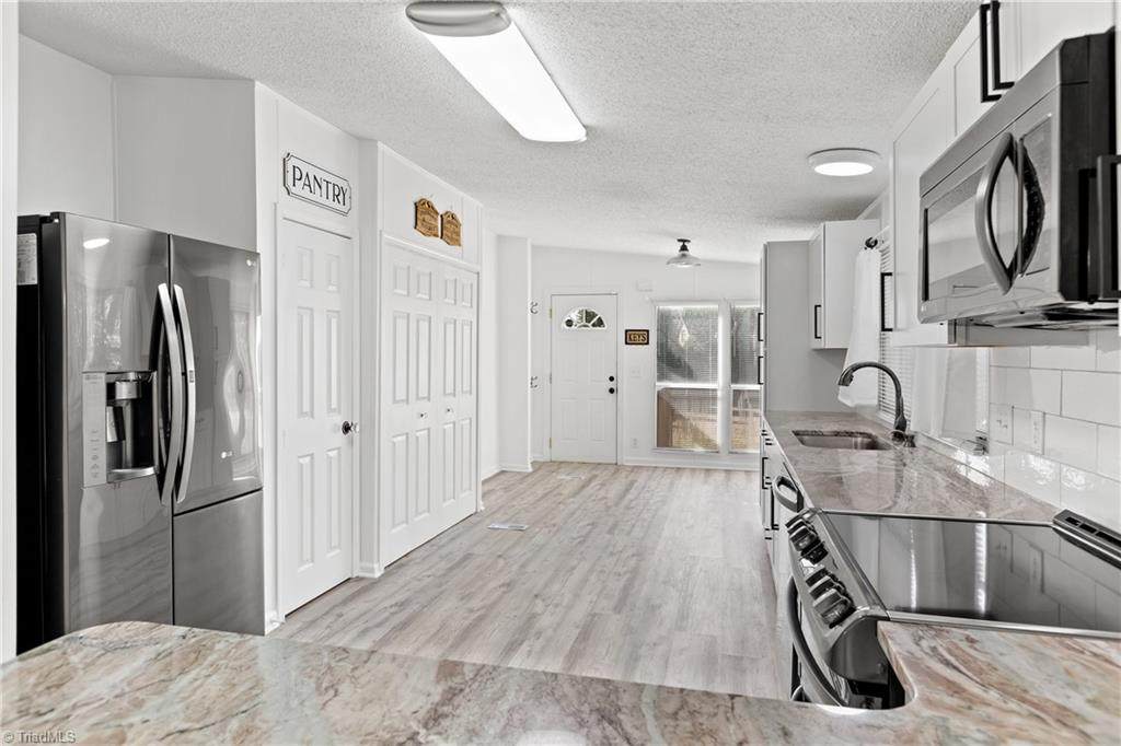 8321 Haw River Road - Photo 1
