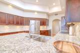 9806 Ridge Shadow Place - Photo 25