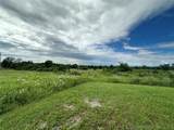 14388 Hwy 169 - Photo 1