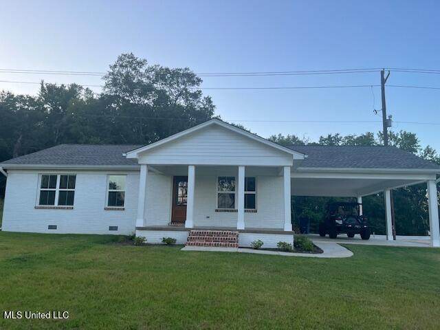 7856 Holly Springs Rd - Photo 1