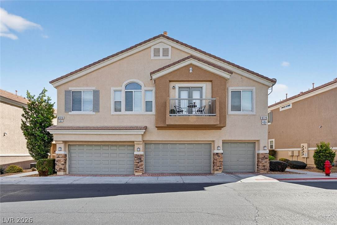 8725 Traveling Breeze Avenue - Photo 1