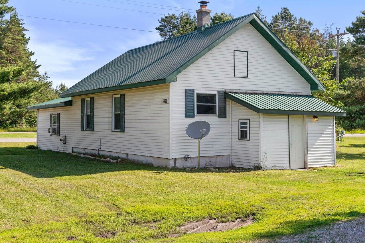 6990 Hartwick Pines Road - Photo 1