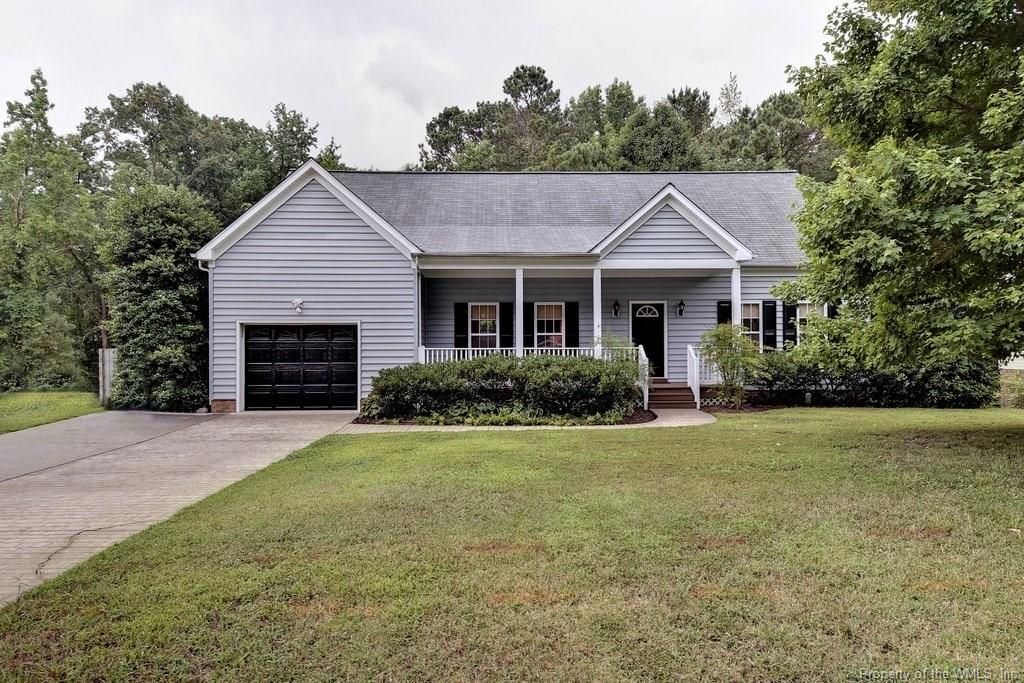 5515 Rolling Woods Drive - Photo 1
