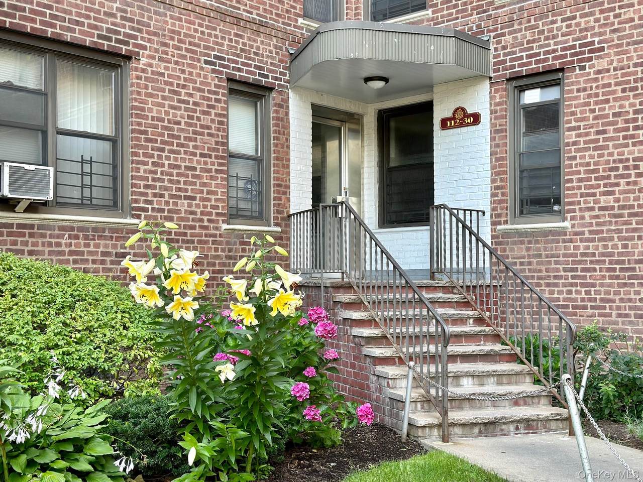 113-15 34th Avenue - Photo 1