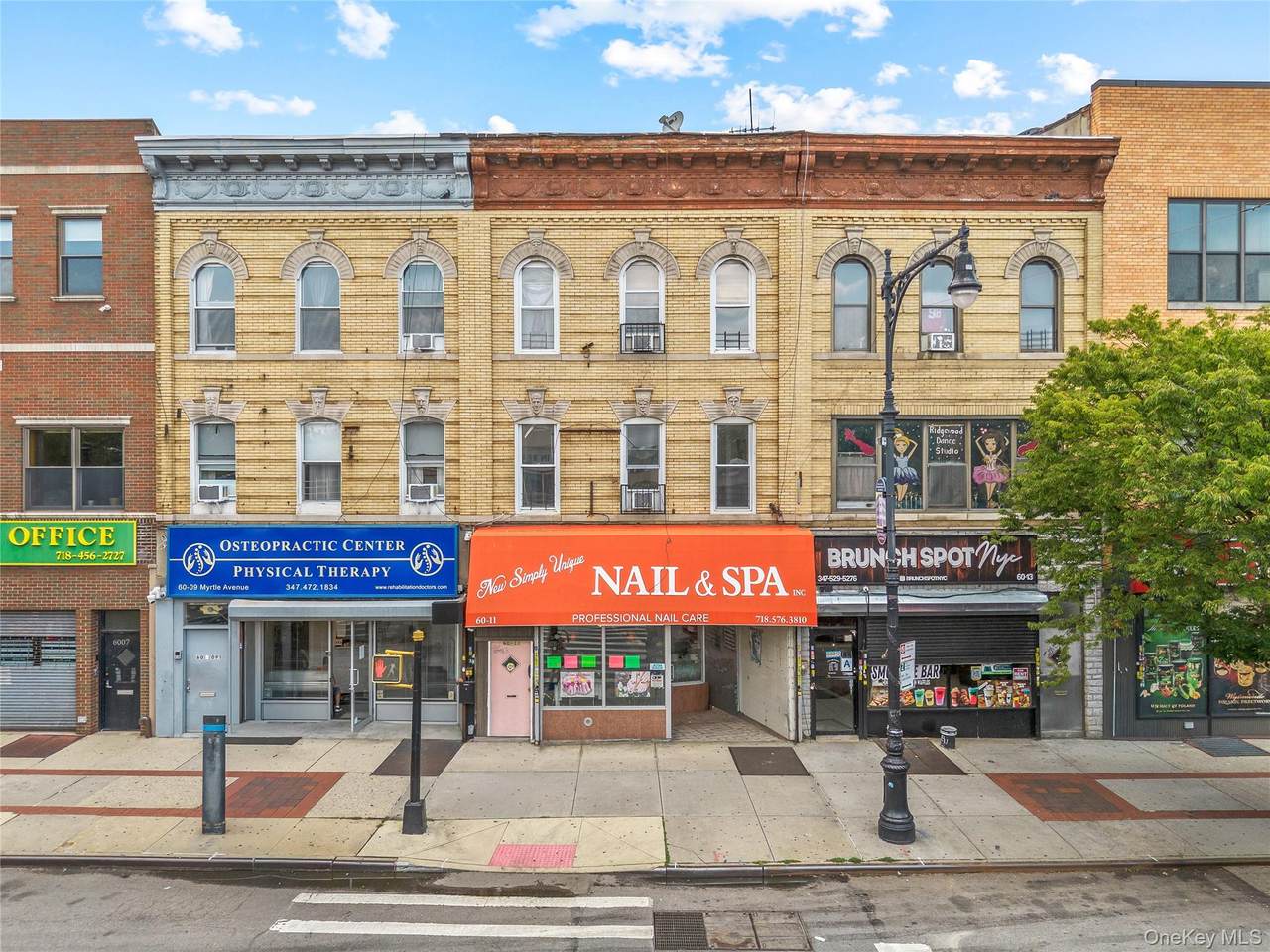 60-11 Myrtle Avenue - Photo 1