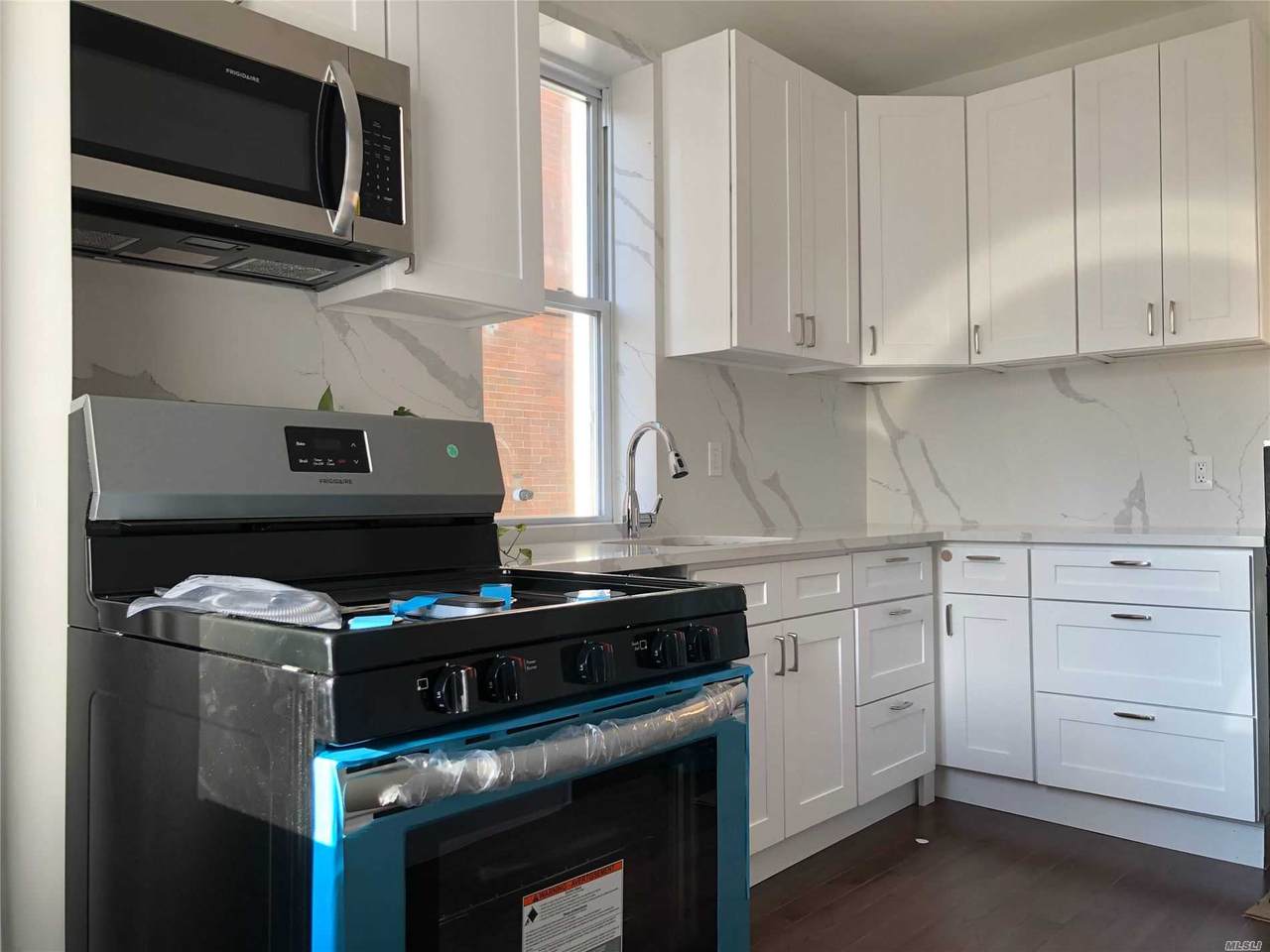 19-66 77 St - Photo 1