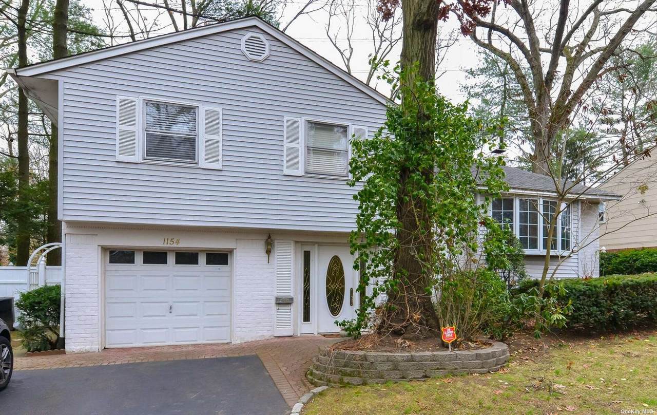 1154 Glen Cove Avenue - Photo 1