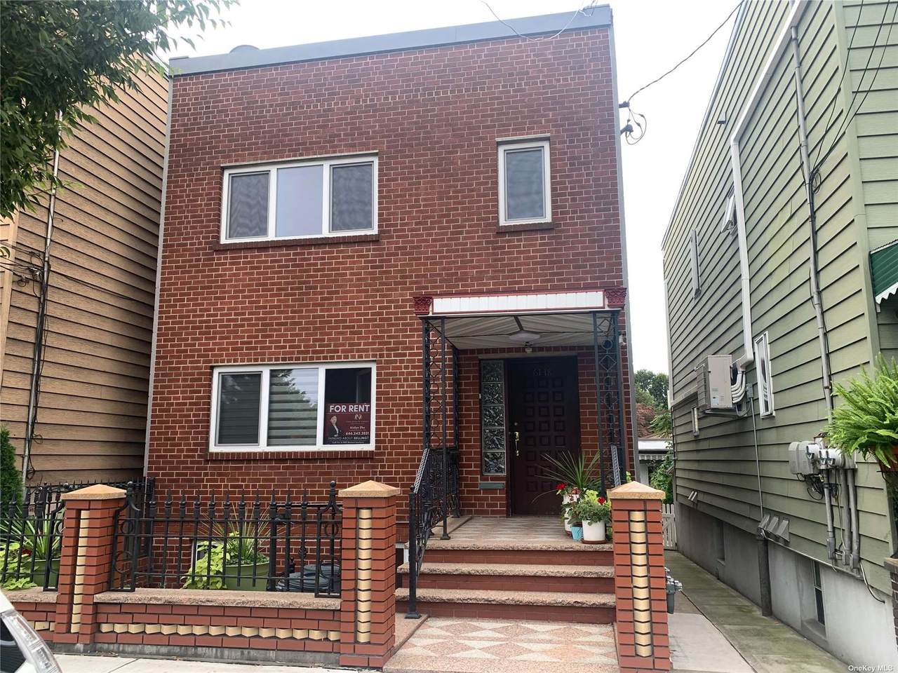 61-18 55th Drive - Photo 1