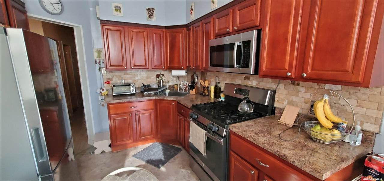 89-12 80th Street - Photo 1
