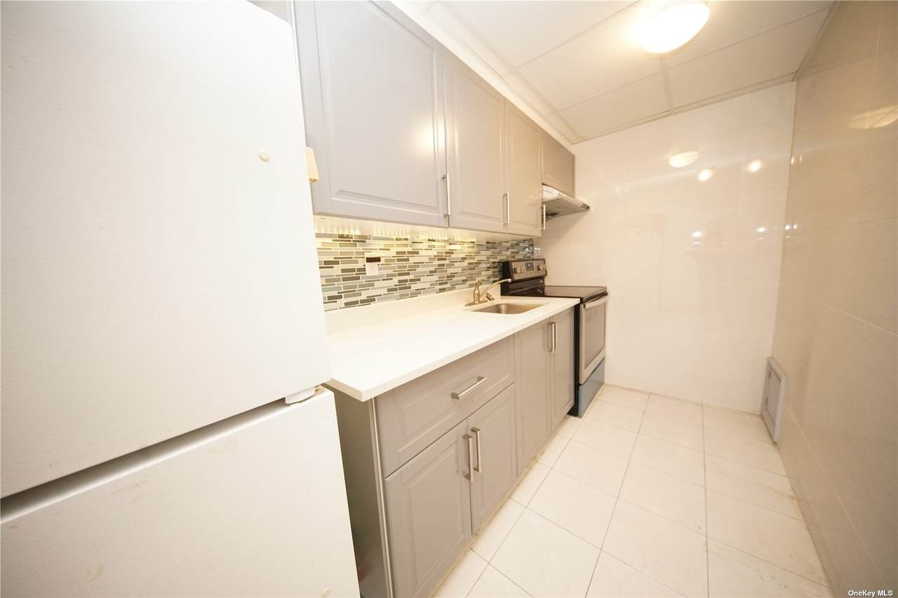 134-04 58th Road - Photo 1