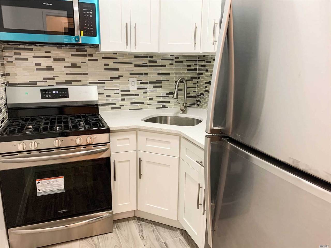 100-25 Queens Blvd - Photo 1