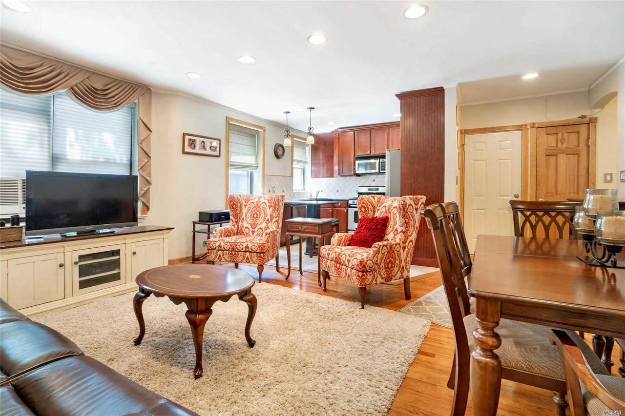 76-11 Ditmars Boulevard - Photo 1