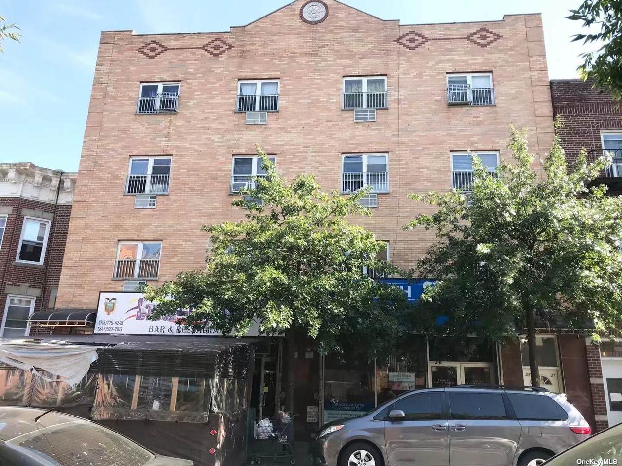 37-31 103St - Photo 1