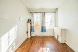 110-10 34th Avenue - Photo 4