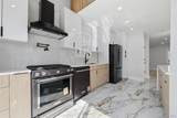 34-26 209th Street - Photo 6