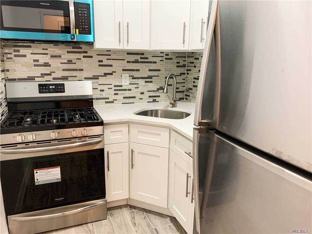 100-25 Queens Boulevard - Photo 1