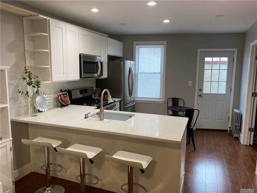 76-05 Cooper Avenue - Photo 1
