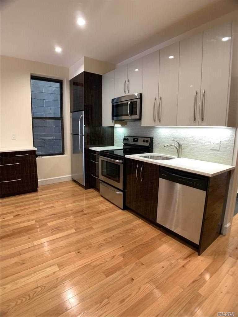 57-34 Myrtle Avenue - Photo 1