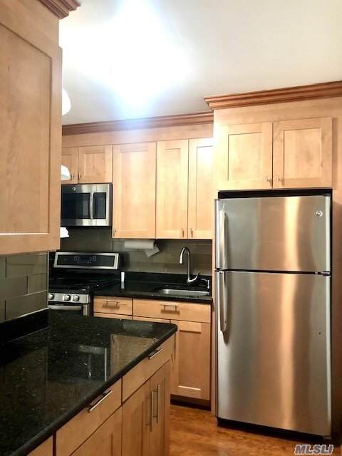 113-15 34 Avenue - Photo 1