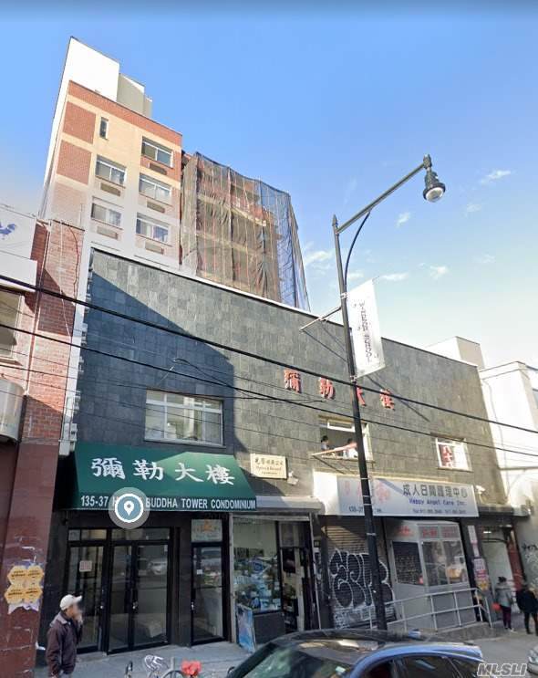 135-37 37th Avenue - Photo 1