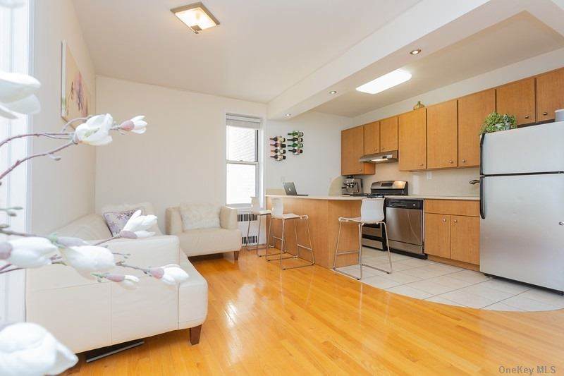 76-12 35th Avenue - Photo 1