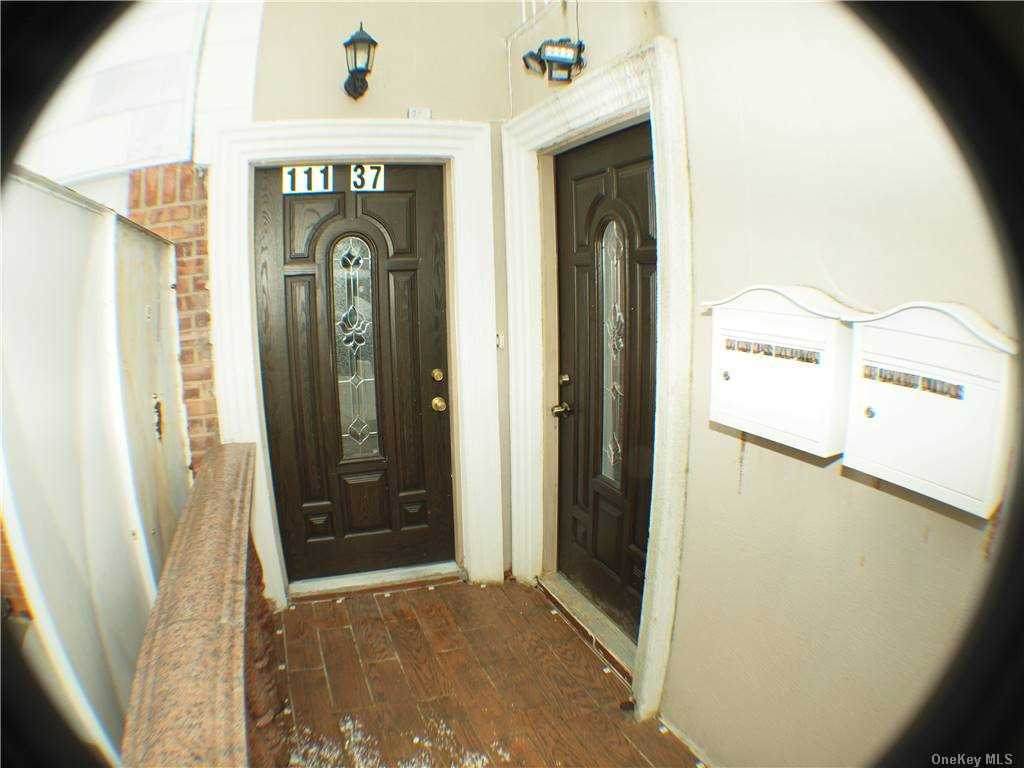 111-37 156St - Photo 1